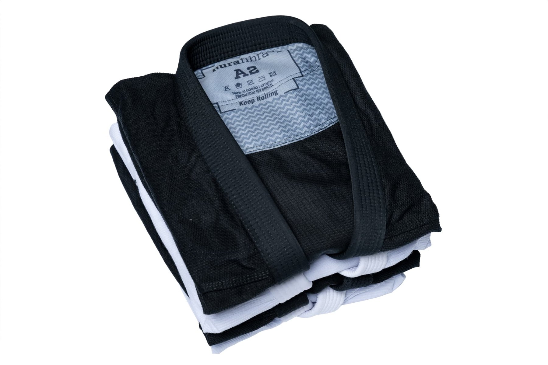 Black folded Pura Fibra gi with visible A2 label and interior reinforcement