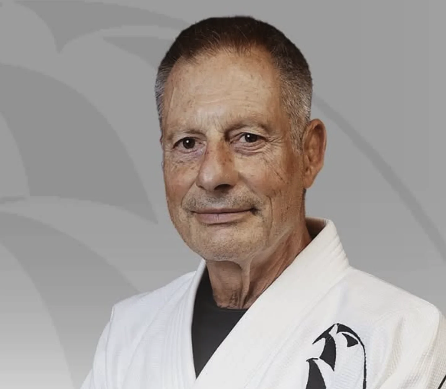 Master Jacare wearing a white gi