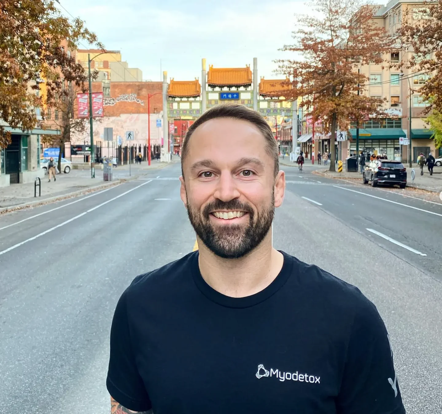 Kevin standing on a city street