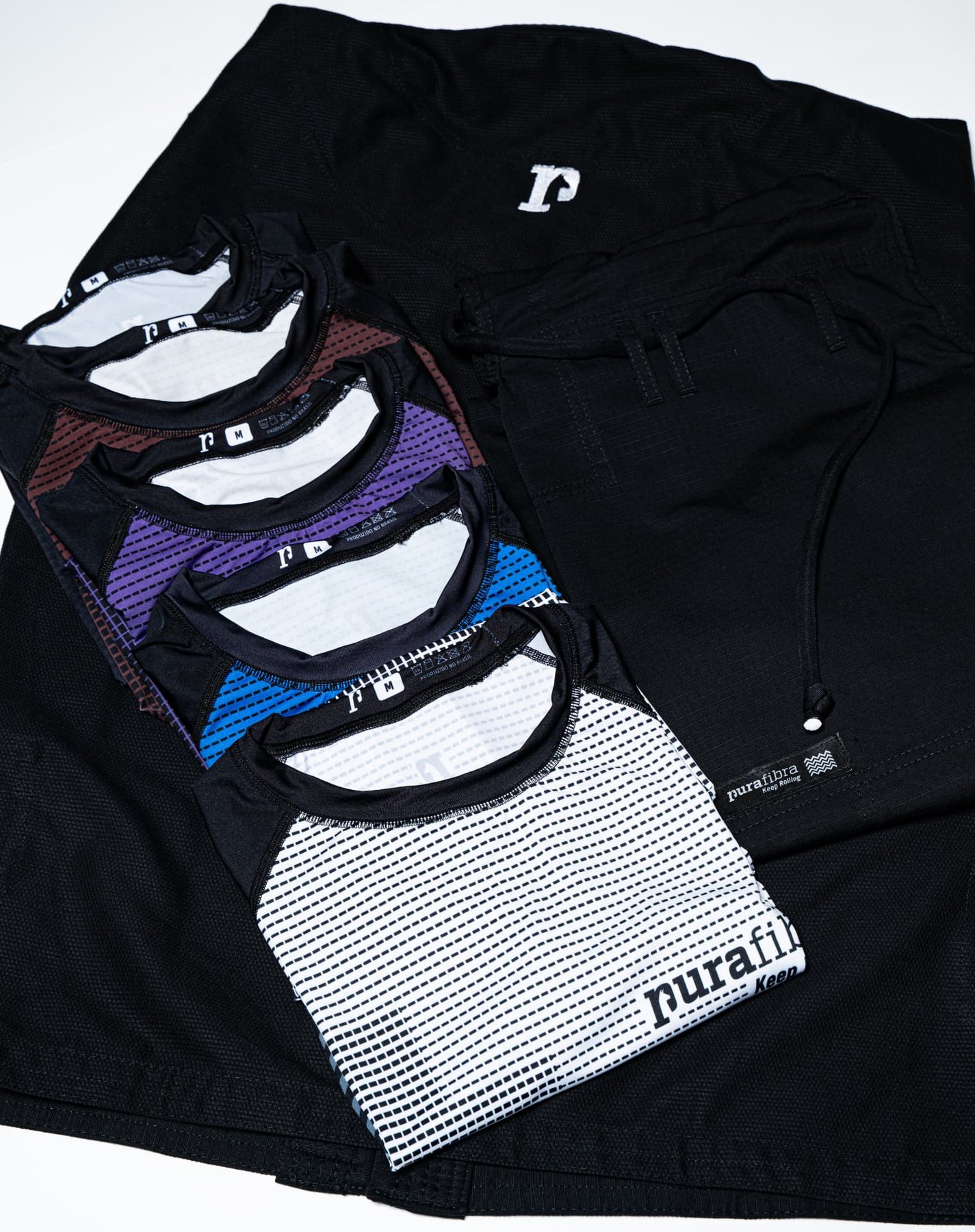 Black gi, black shorts and stacked Pura Fibra rashguards