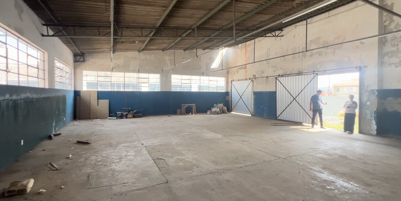 The rough, mostly empty 900 square metre building before factory setup